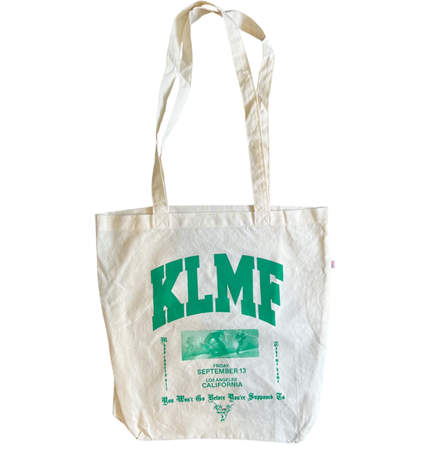 Knocked Loose's "KLMF" design, printed on the front of a natural LA Apparel tote bag.