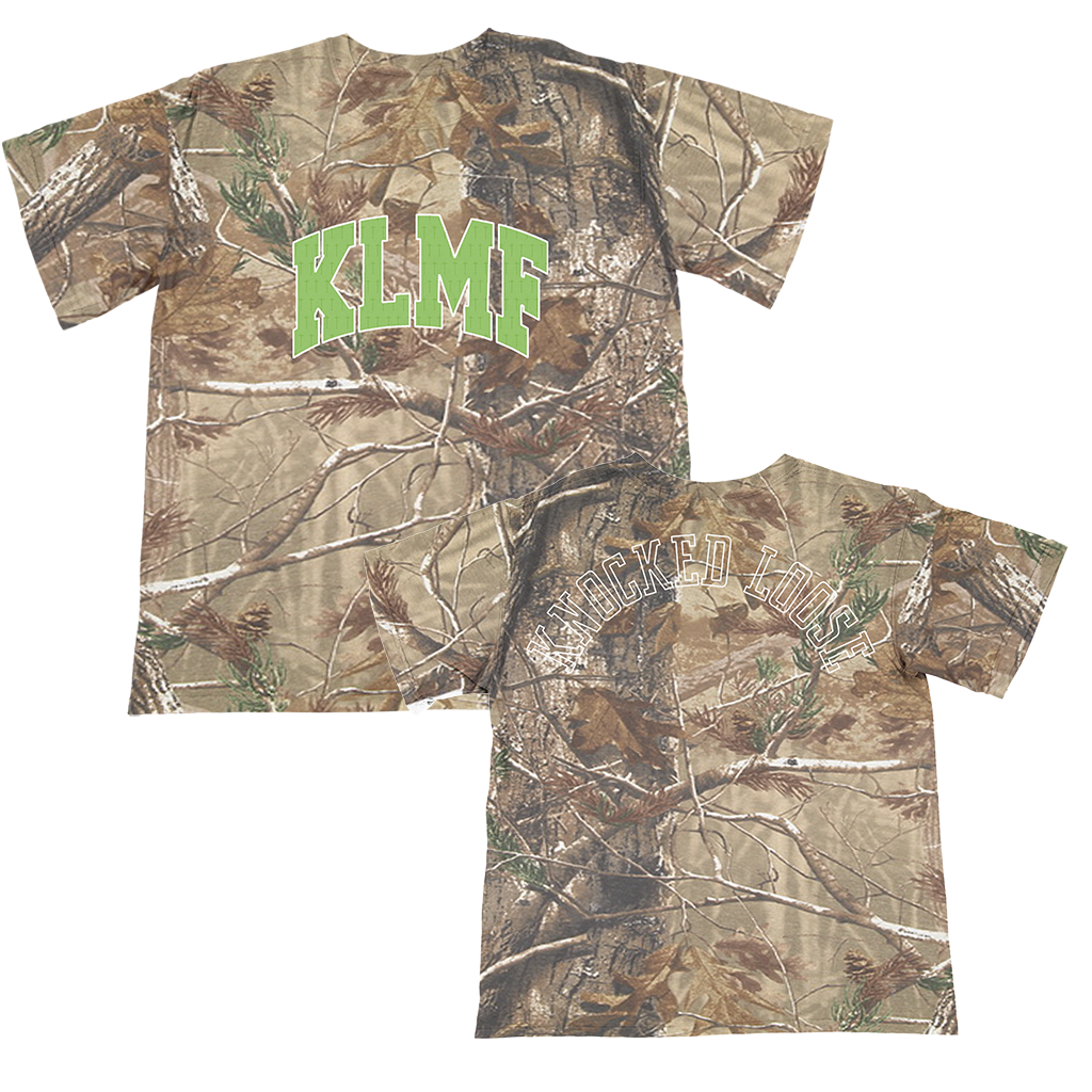 Knocked Loose's "Cross Overlay KLMF" design, printed on the front and upper back of a Real Tree Camo Tee.