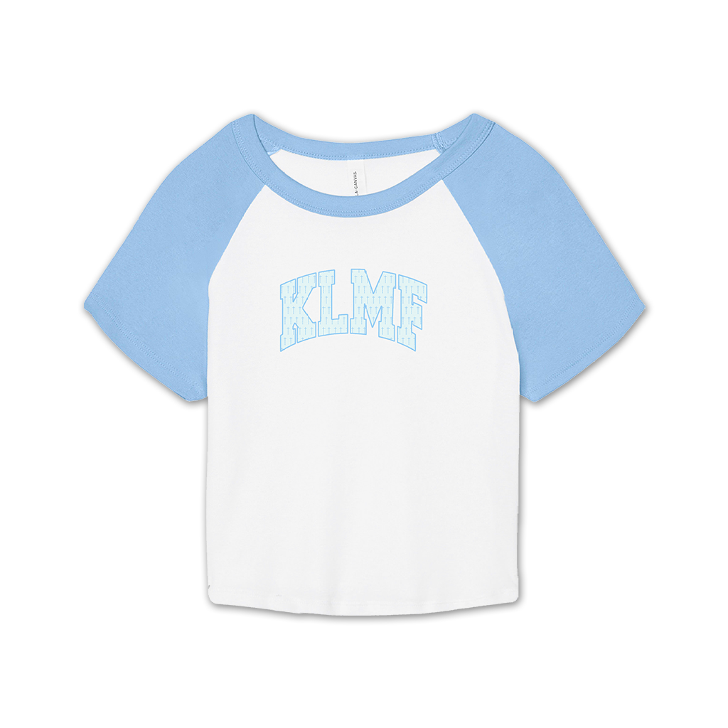 Knocked Loose's "KLMF Cross Overlay" design, printed on the front and back of a white and baby blue color Bella and Canvas raglan crop top.