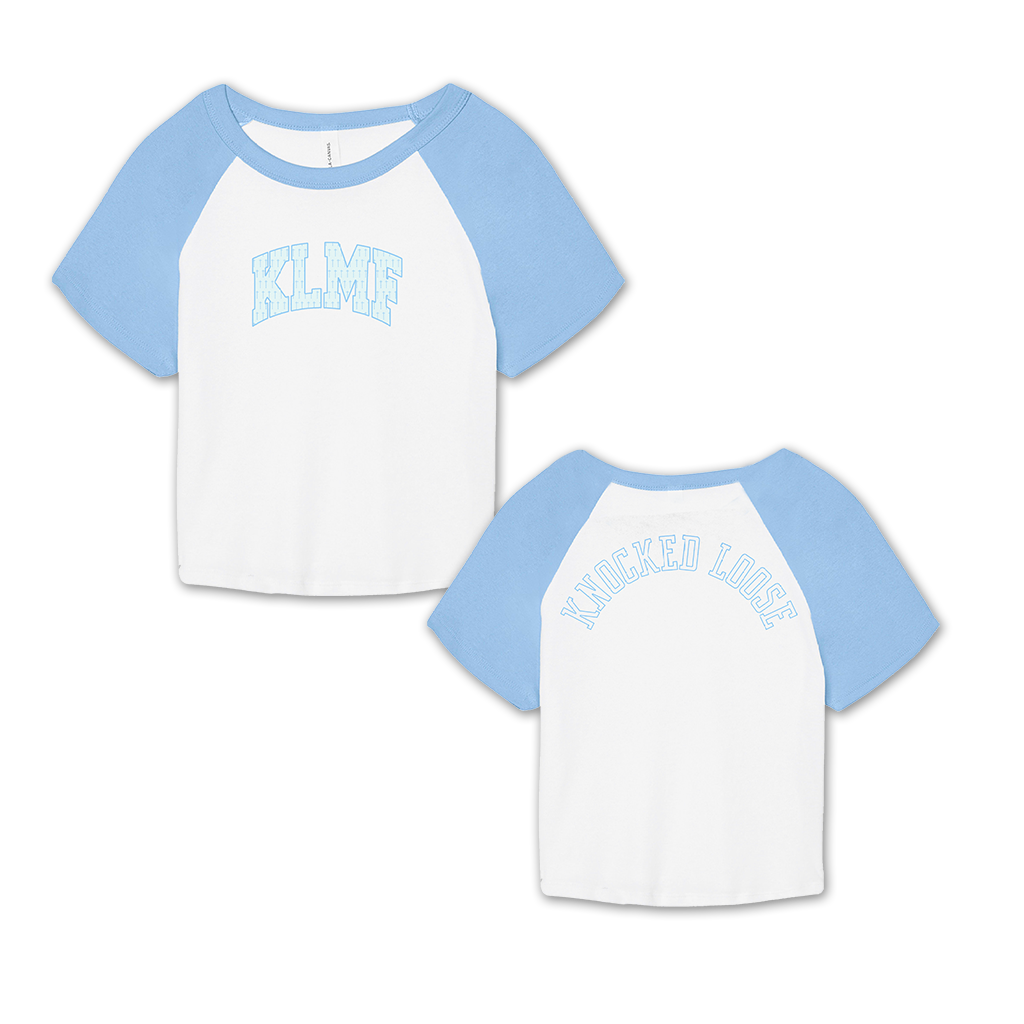 Knocked Loose's "KLMF Cross Overlay" design, printed on the front and back of a white and baby blue color Bella and Canvas raglan crop top.