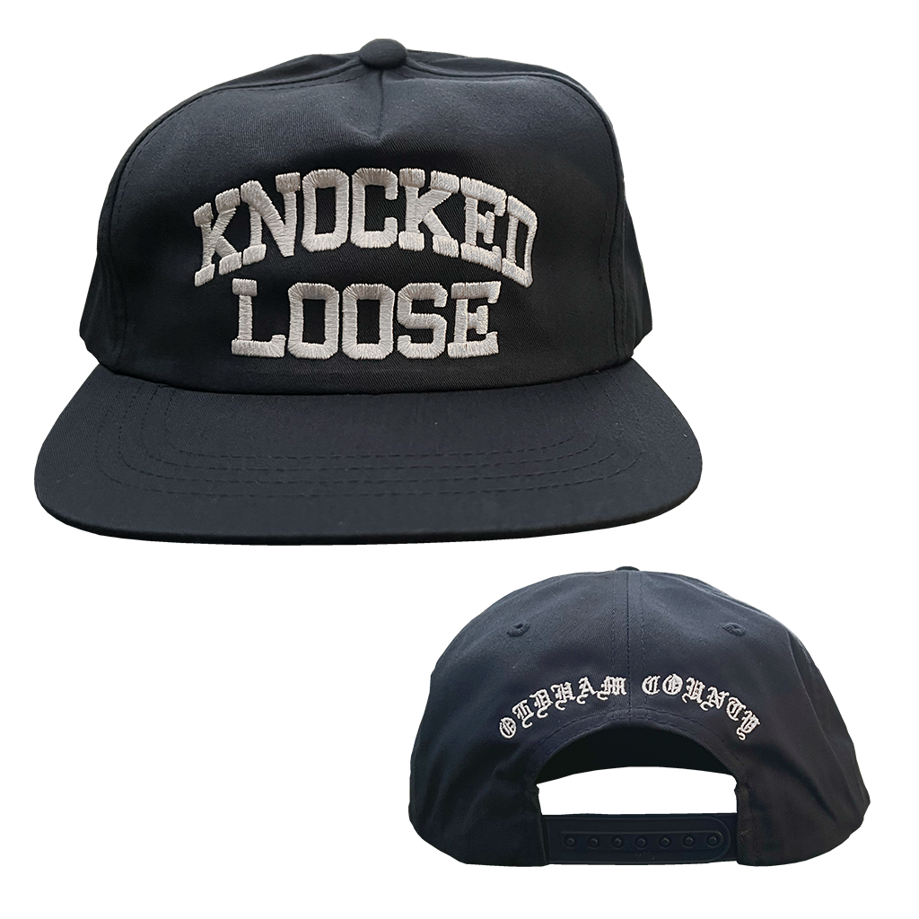 Knocked Loose's "Varsity Arch" design embroidered on the front and back of a navy Yupoong Snapback.